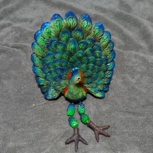 Peacock shelf sitter